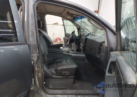 2009 Nissan Titan Pro-4X z USA, uszkodzony, nr VIN 1N6BA07C09N306361